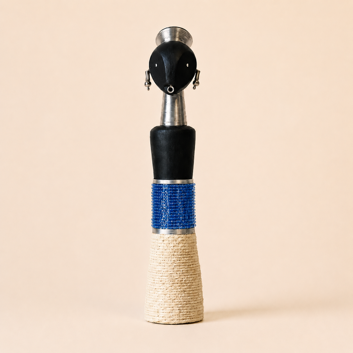 Decorative Carved Doll with blue glass beads and rope