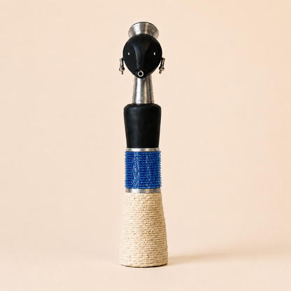 Decorative Carved Doll with blue glass beads and rope