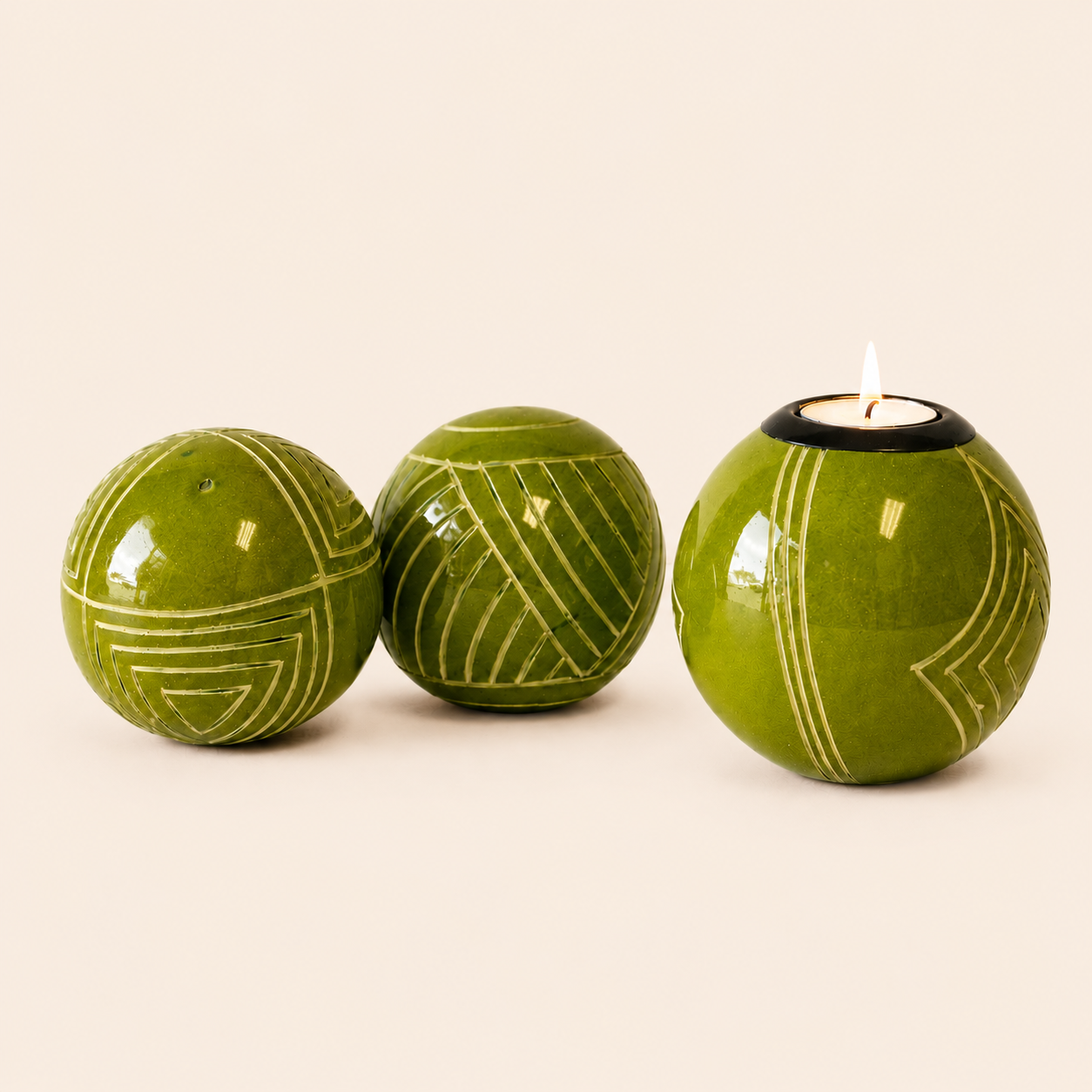 Carved and coloured Monkey Balls and Tlite in a lime set on a light beige coloured background