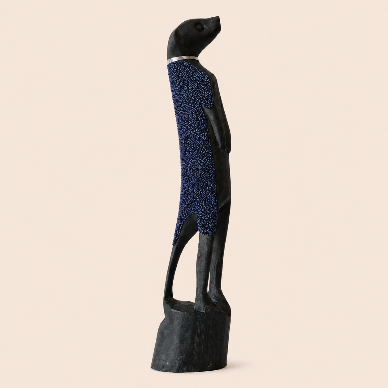 Classic Sand Meerkat Navy on a beige background