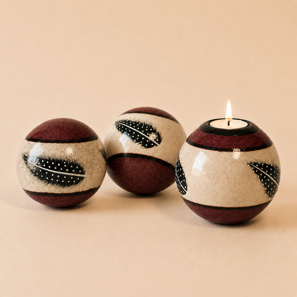 Coloured Feather Monkey Balls & Tlite in Burgundy on a beige background
