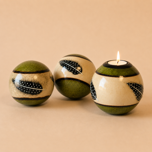 Coloured Feather Monkey Balls & Tlite in Lime on a beige background