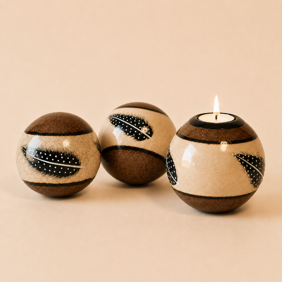 Coloured Feather Monkey Balls and Tlite in Brown on a beige background