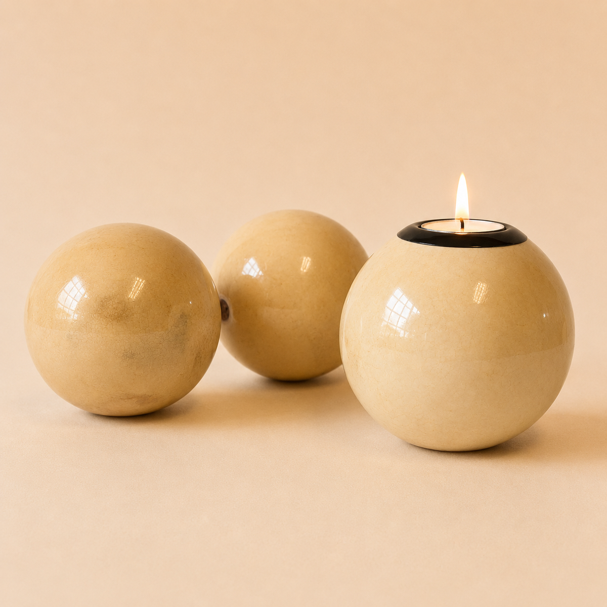 Coloured Monkey Ball Tlite Natural on a beige background