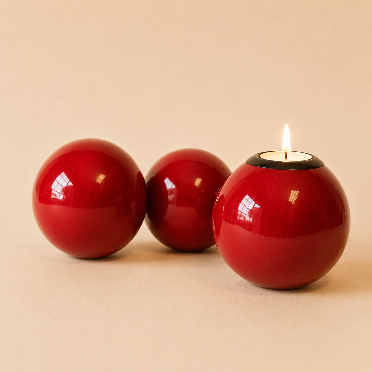 Coloured Monkey Ball Tlite Red on a beige background