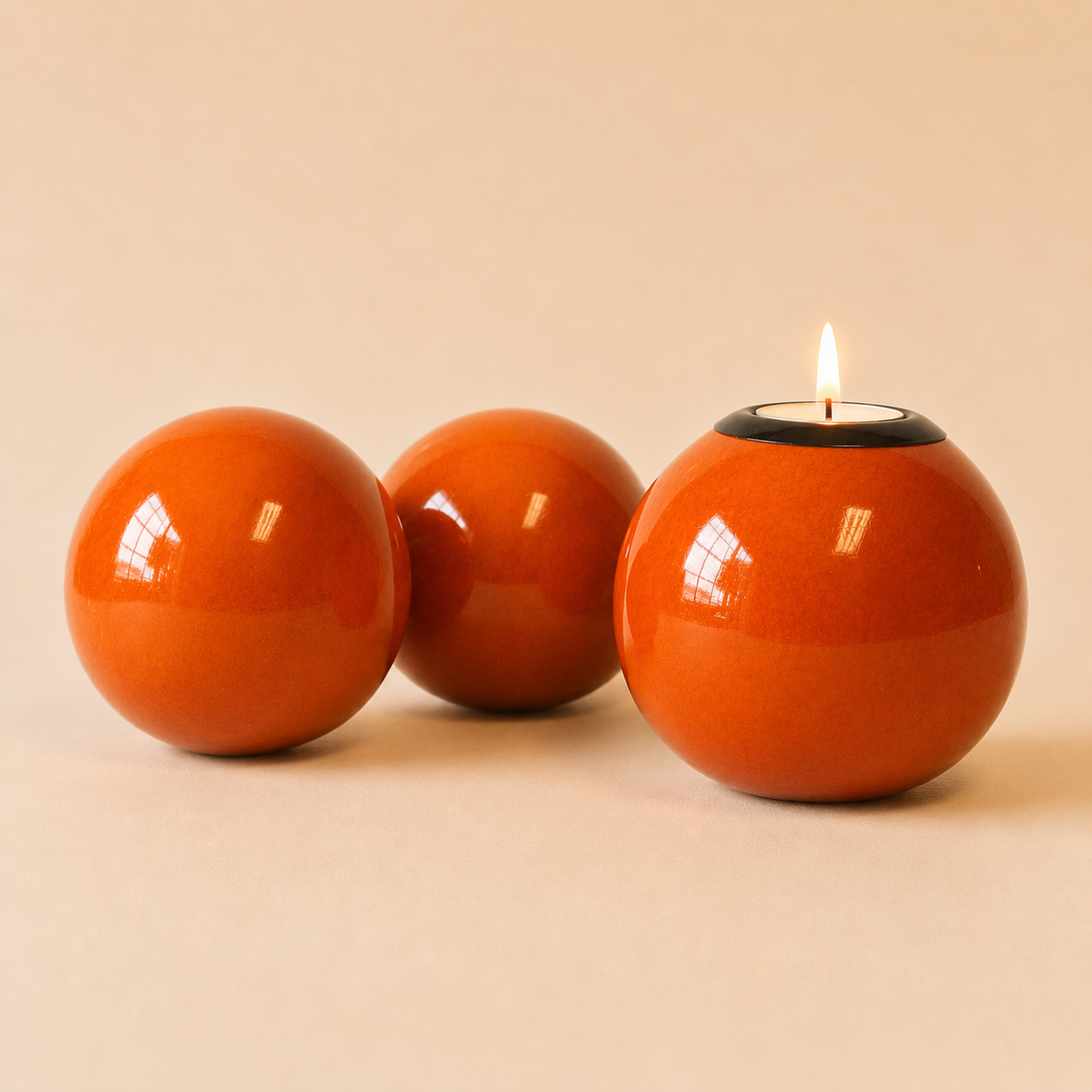 Coloured Monkey Ball and Tlite in Orange colour on a beige background
