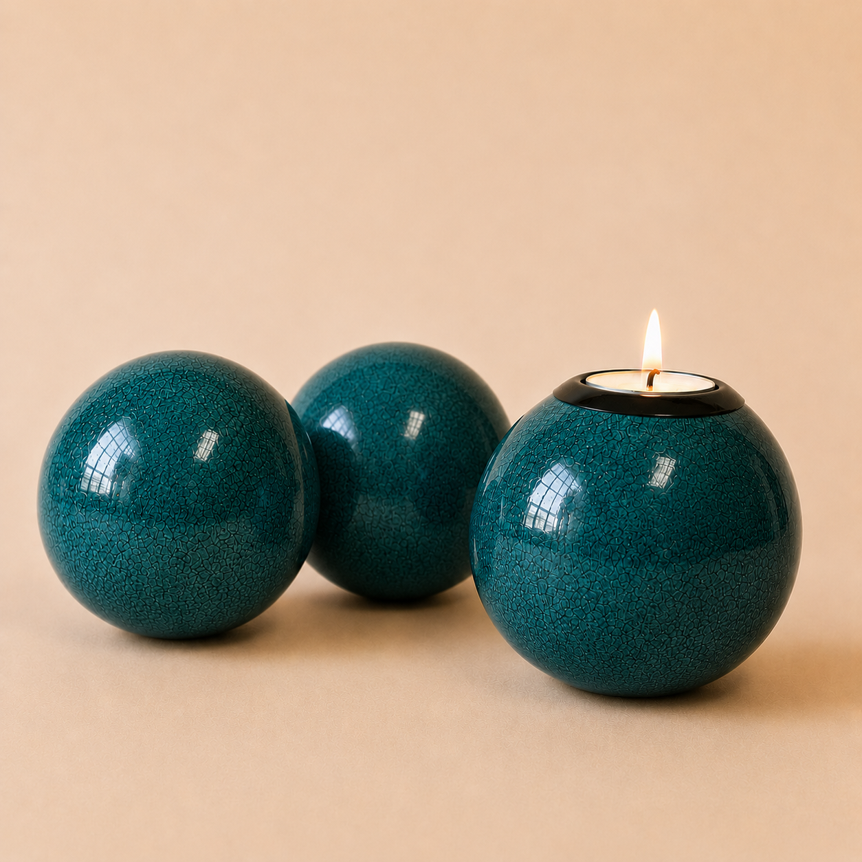 Coloured Monkey Ball & Tlite in Turquoise set on a beige background