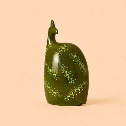 Hand painted Ethnic Guinea-fowl carving in lime with a beige background