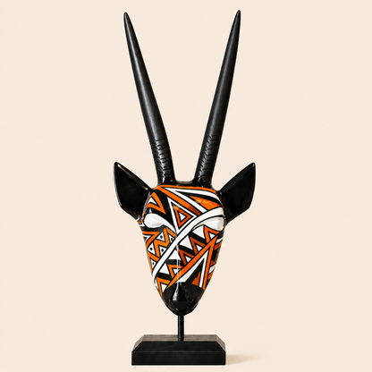 Ndebele Mono Antelope Head with orange design on a beige background