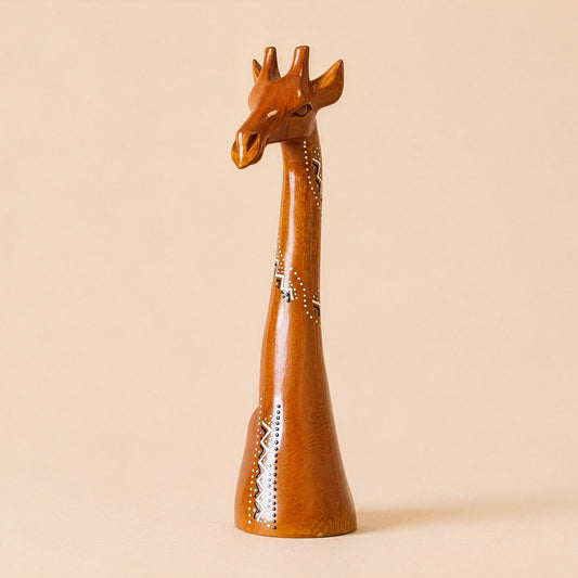 Wooden giraffe figurine on a beige background with ethnic patterns